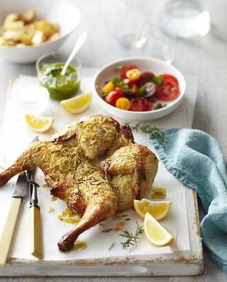 Butterflied Chicken Roasted With Panko Parmesan Crust Served With Salsa Verde