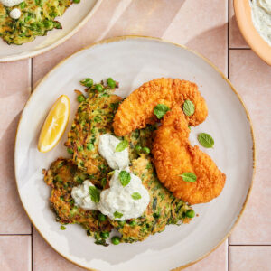 Buttermilk Chicken with pea & haloumi fritters
